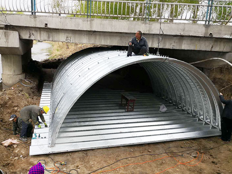 Old Bridge Reinforcement by Corrugated Steel Arch